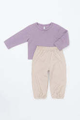 Avauma baby jogger set in Lavender Pale – pastel purple top and beige jogger pants for toddler girls